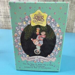 The Enesco Precious Moments Collection Holiday Expressions Unicycle Dated 1992